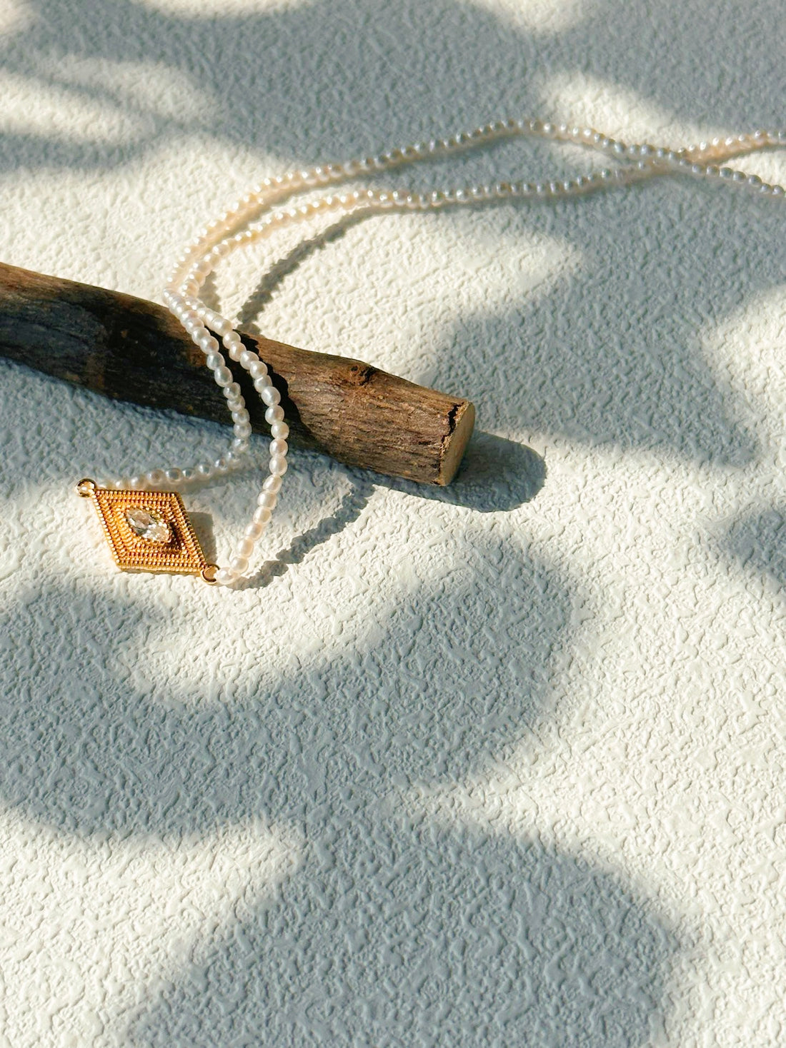 Golden Eye Pearl Necklace
